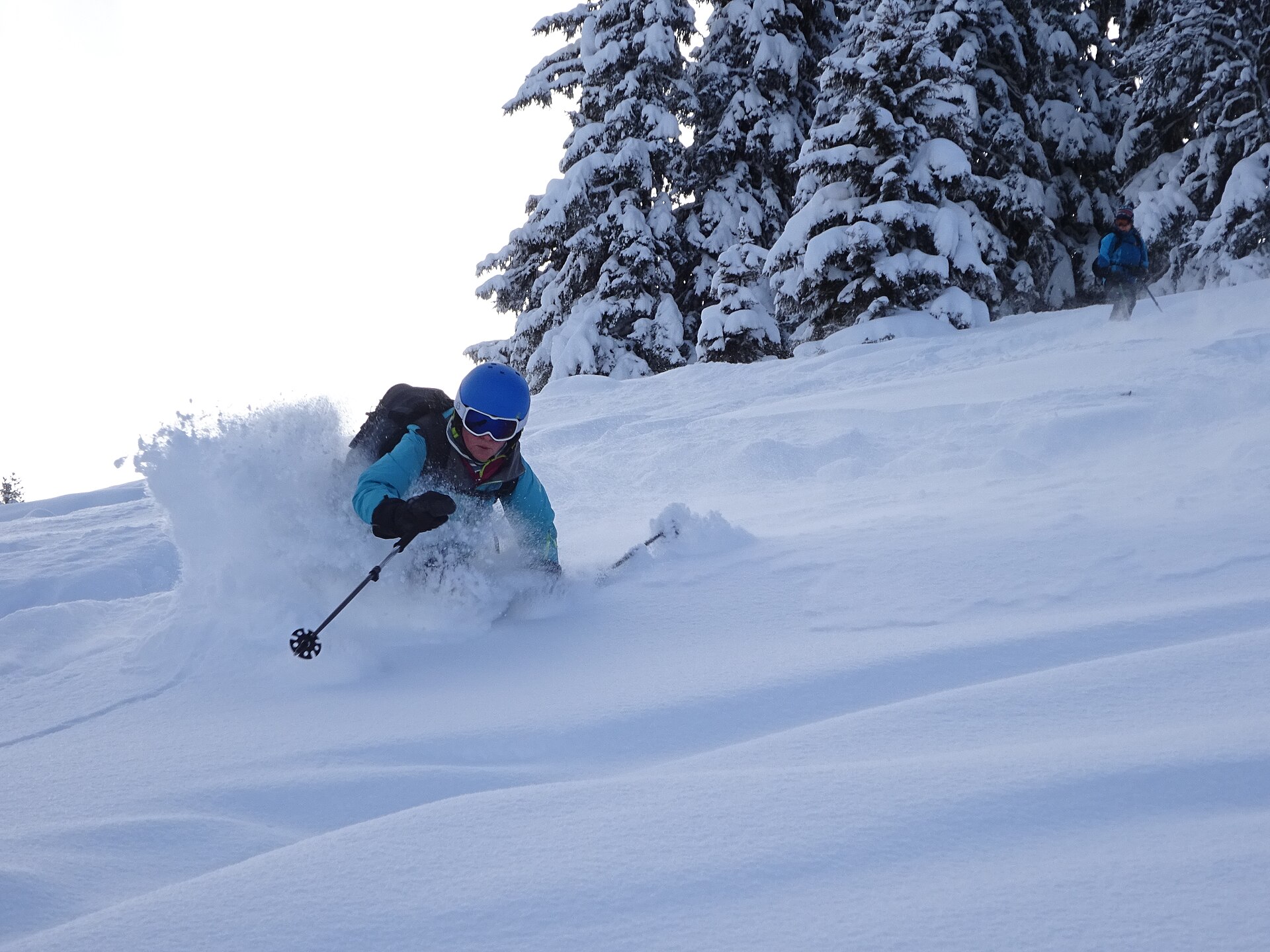 Skier in deep Japanese powder